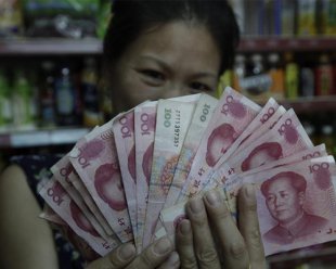 China desvaloriza sua moeda em 2% para aumentar as exportações